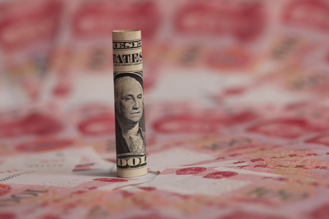 人民币对美元中间调升27个基点